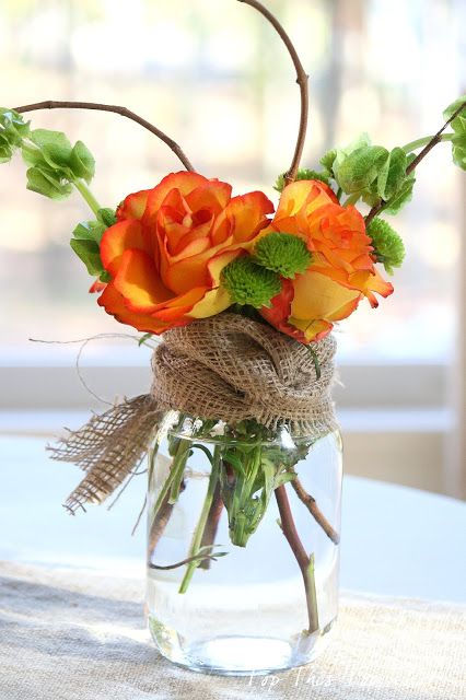 image of baby shower flower arrangement in a mason jar